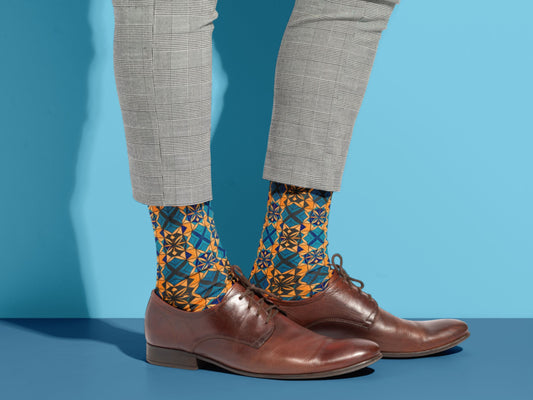 Abstract Art Socks styled with dress shoes in a lifestyle shot