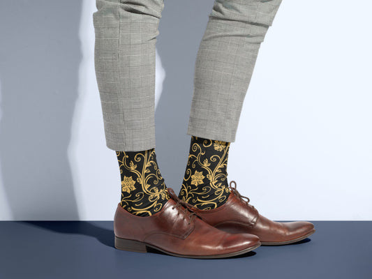 Gold Baroque Socks styled with dress shoes in a lifestyle shot