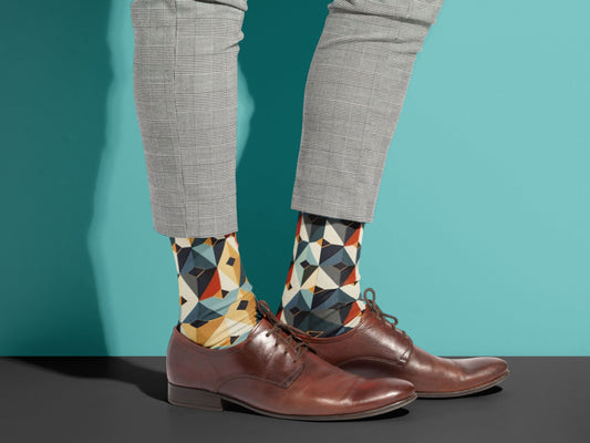 Japanese Geometric Dress Socks styled with dress shoes in a lifestyle shot