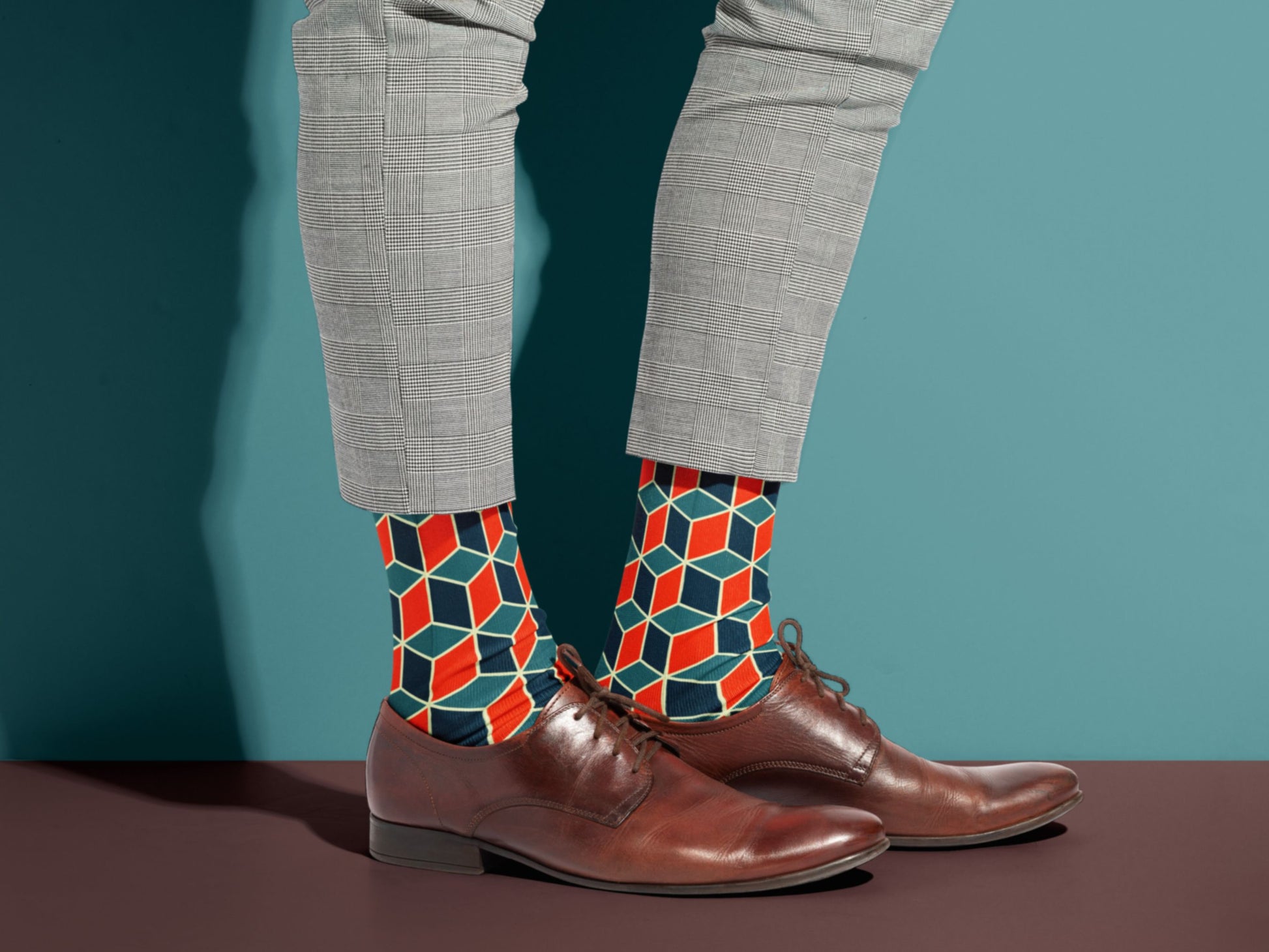 Nautical Geometric Socks styled with dress shoes in a lifestyle shot