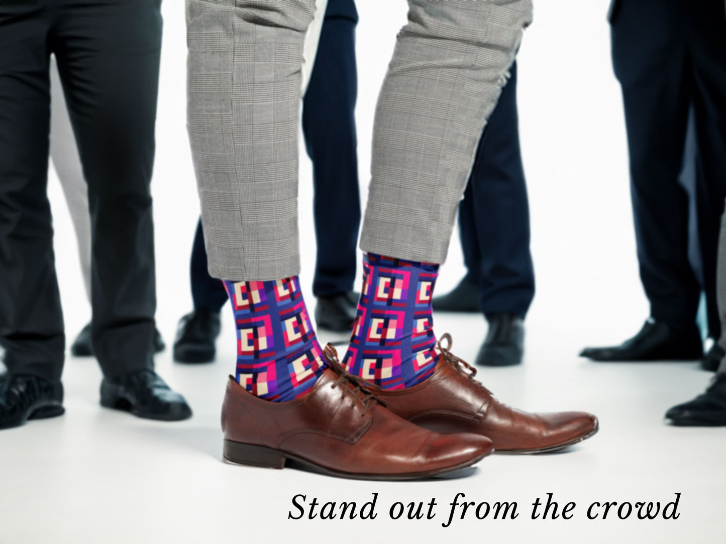 Bold Geometric Socks lifestyle vibe shot with everyone else wearing boring black socks, text reads "Stand out from the Crowd"