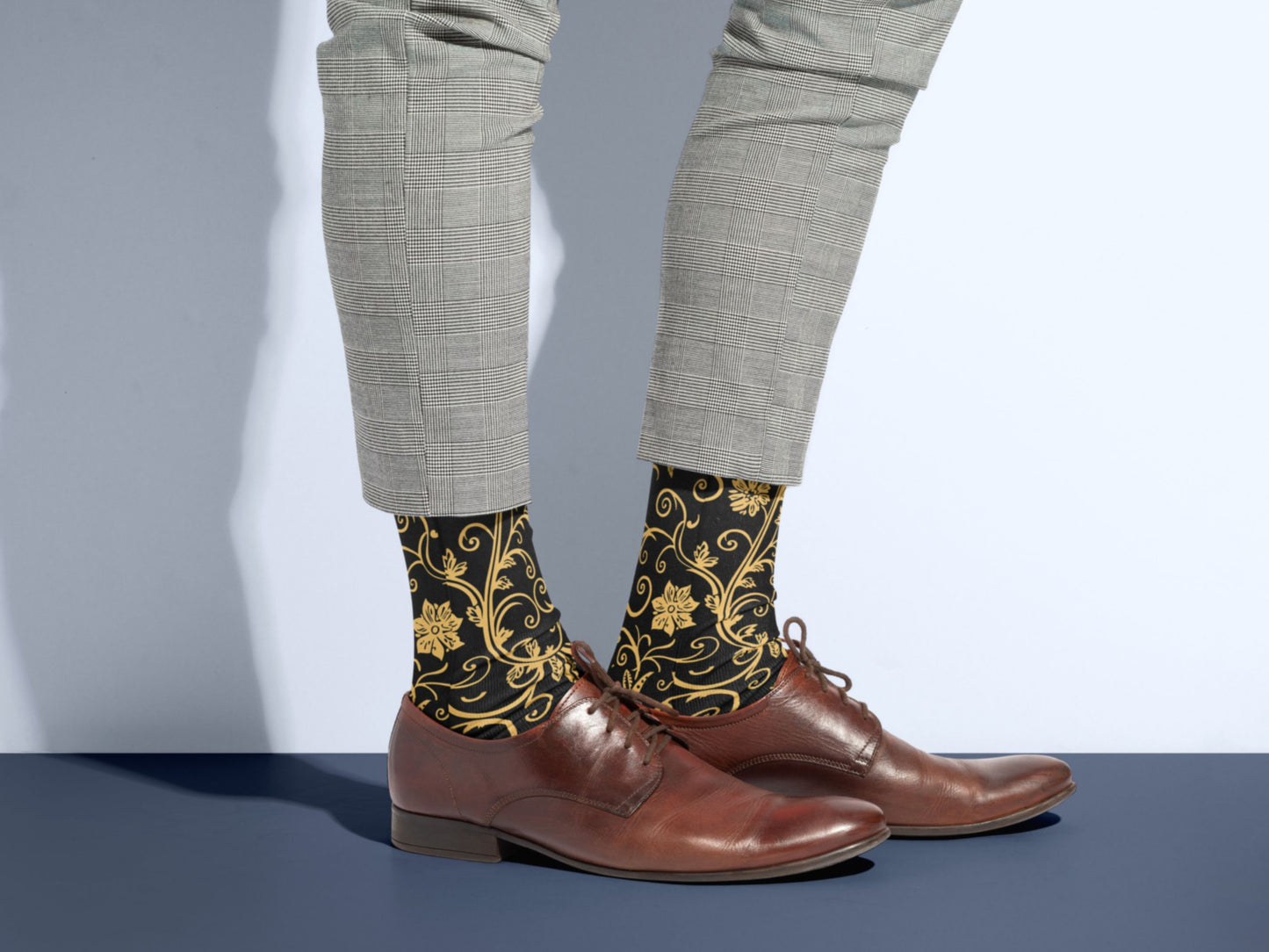 Gold Baroque Socks styled with dress shoes in a lifestyle shot