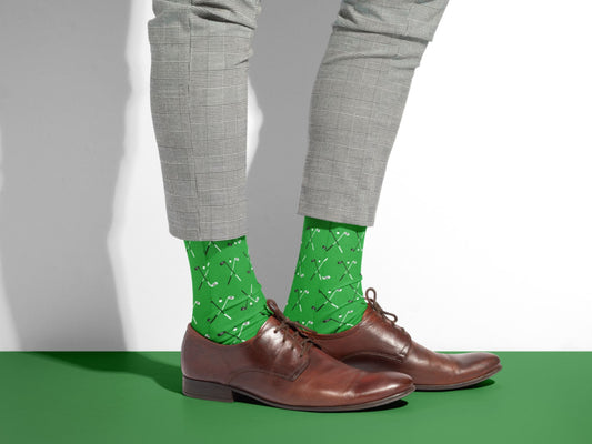 Green Golf Socks – Club & Ball Pattern Crew styled with dress shoes in a lifestyle shot