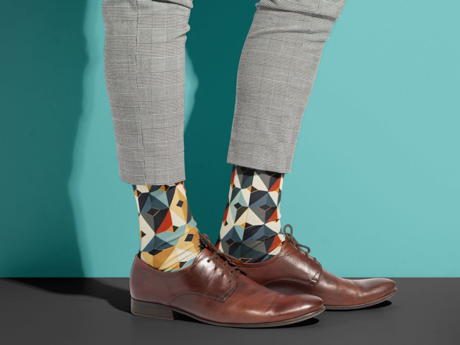 Japanese Geometric Dress Socks styled with dress shoes in a lifestyle shot