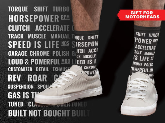 Motorsports Fan Automotive Text Socks – Novelty Crew in a lifestyle shot with text "Gift for Motorheads"