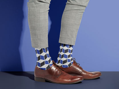 Navy Geometric Dress Socks styled with dress shoes in a lifestyle shot