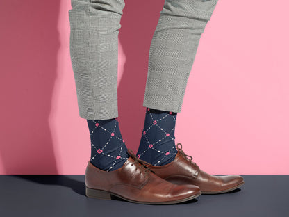 Pink Dot Grid Dress Socks styled with dress shoes in a lifestyle shot