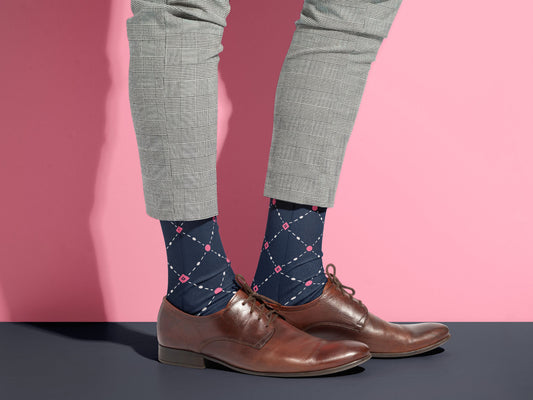 Pink Dot Grid Dress Socks styled with dress shoes in a lifestyle shot